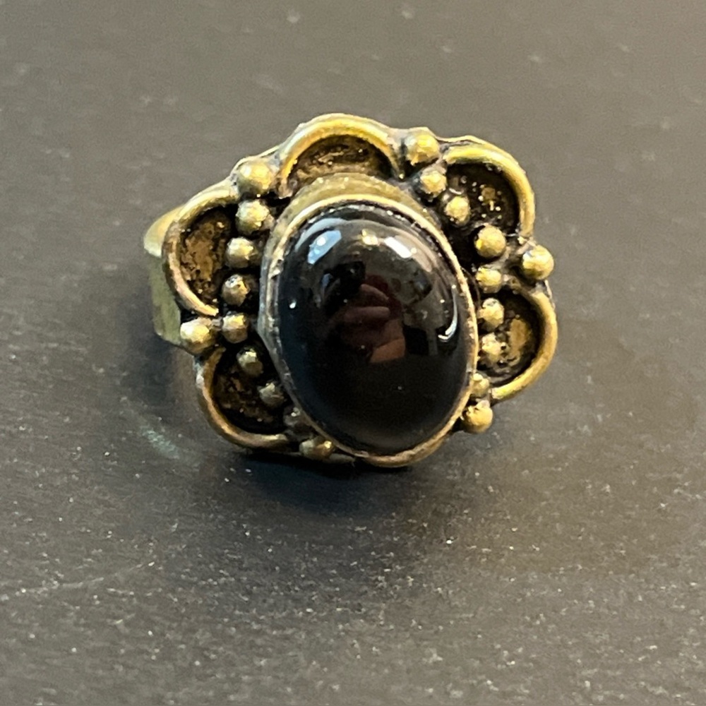 Elegant Black and Gold Ring
